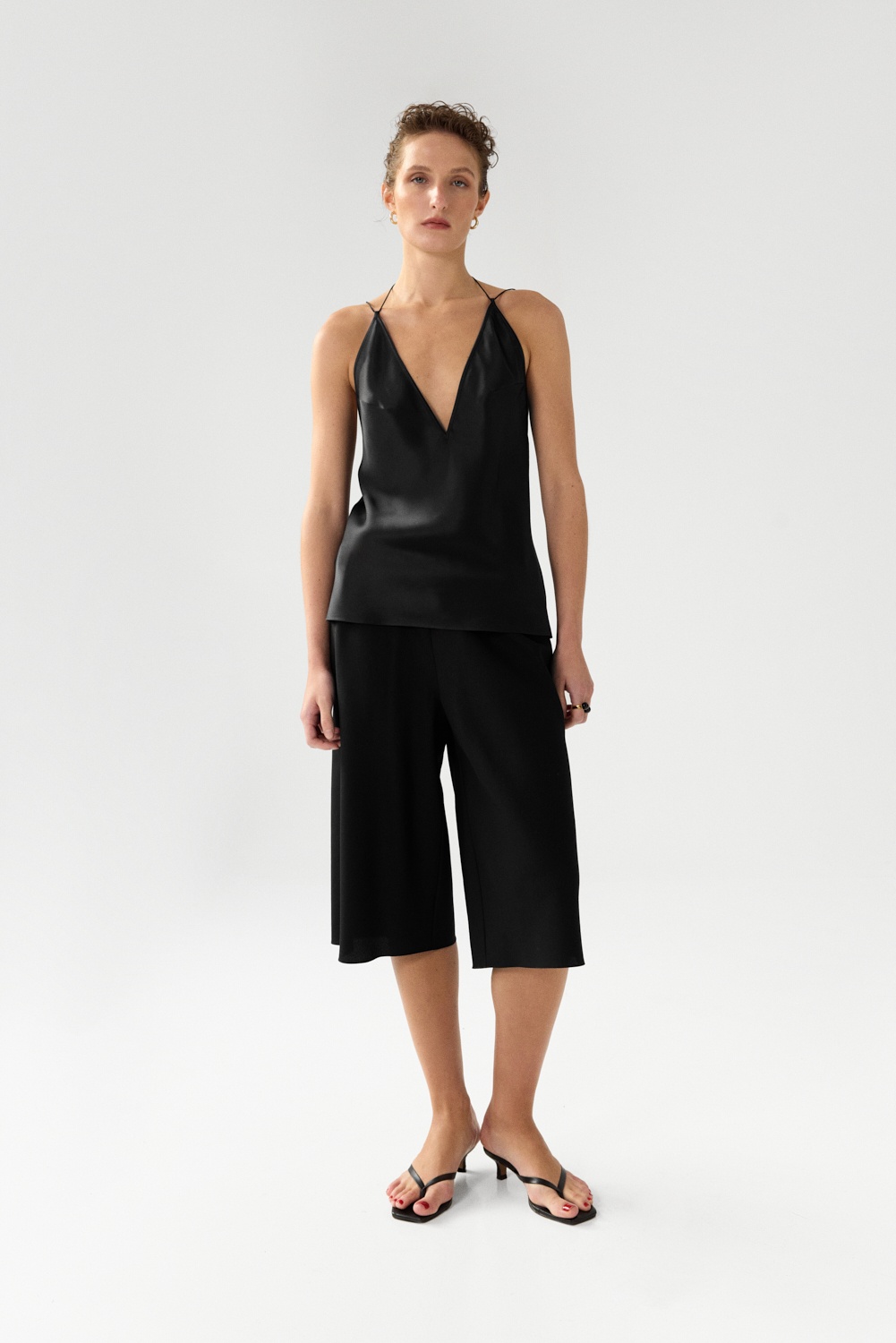 Harlow Black bias cut longline shorts in Silk Cady
