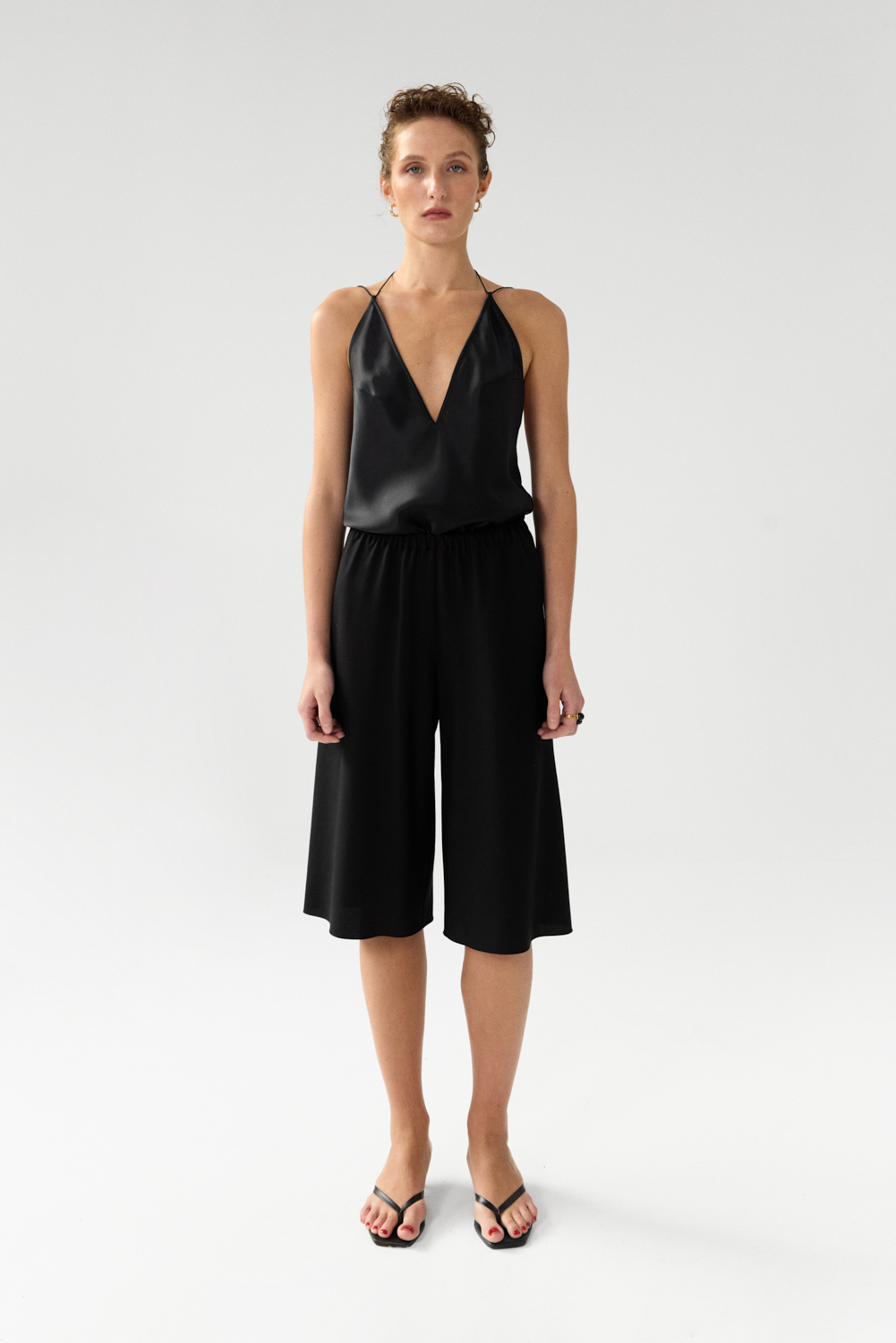 Harlow Black bias cut longline shorts in Silk Cady